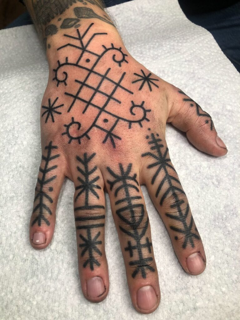 Ornamental and ethnic tattoo by Austris Briedis, Rīgas Tinte