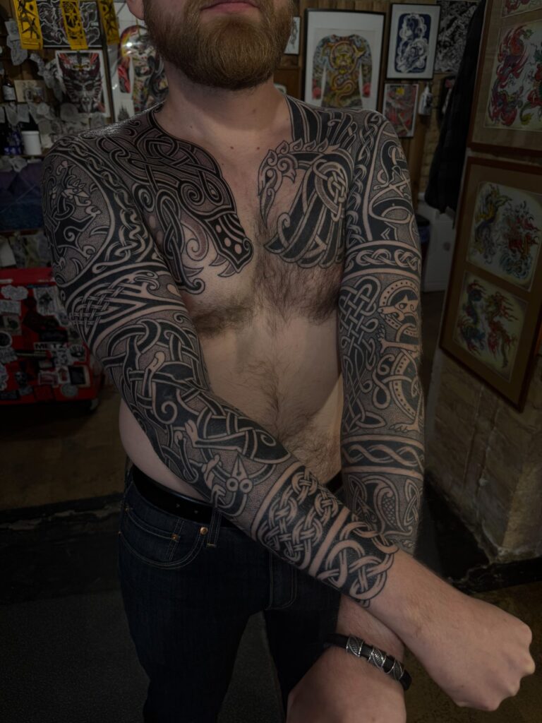 Ornamental and ethnic tattoo by Austris Briedis, Rīgas Tinte