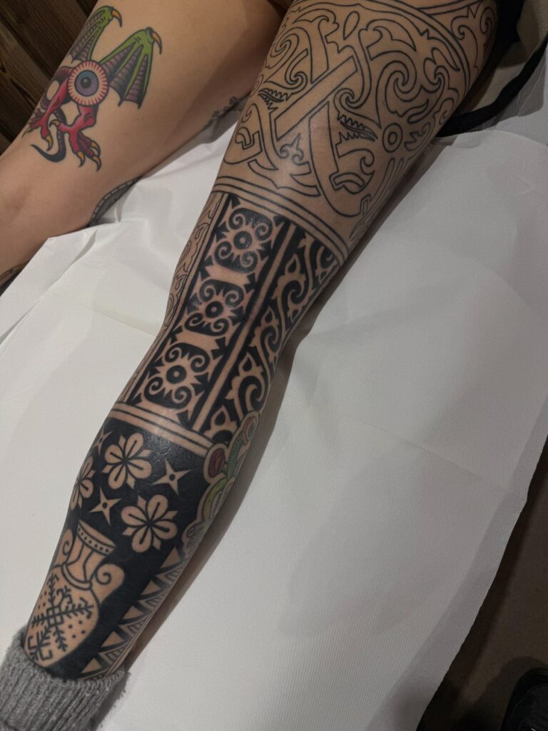 Ornamental and ethnic tattoo by Austris Briedis, Rīgas Tinte