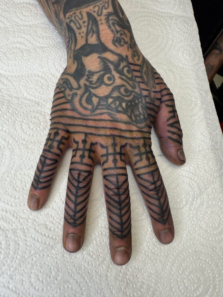 Ornamental and ethnic tattoo by Austris Briedis, Rīgas Tinte