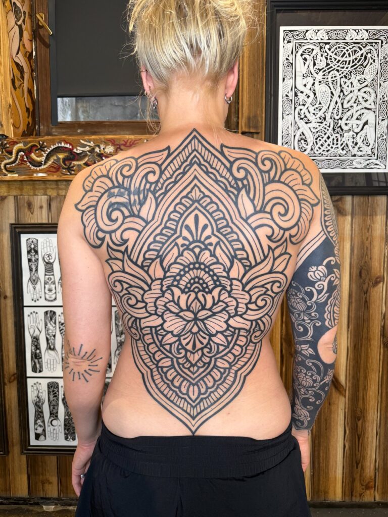 Ornamental and ethnic tattoo by Austris Briedis, Rīgas Tinte